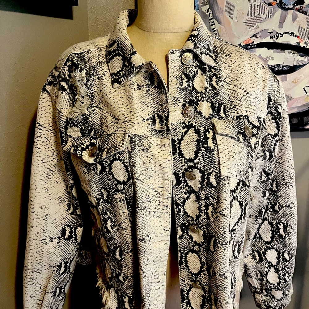 Vici snake skin ripped Jean jacket.